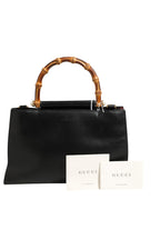 GUCCI rankinė